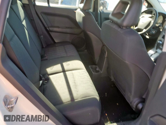 2008 Dodge Caliber SE z VIN 1B3HB28B08D635448, wystawiony jako Copart lot #53859305 z przebiegiem 237 653 mil mil oraz Czysty tytuł • Clean title. Historia ofert i sprzedaży dostępna na DreamBid. Obrazek 11.