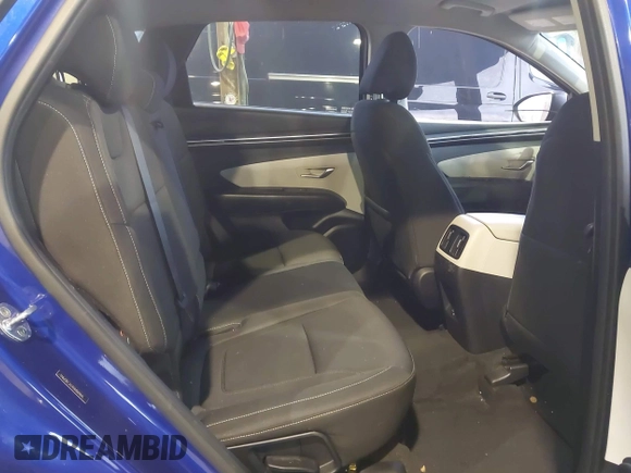2022 Hyundai Tucson SEL with VIN 5NMJBCAEXNH069845, listed as a IAAI auction lot 41481383 with 10,985 mi miles and . Bid and sale history available at DreamBid. Image 8.