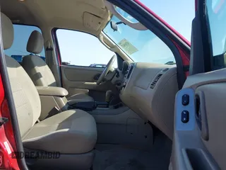 2006 Ford Escape XLT with VIN 1FMYU03106KB20126, listed as a IAAI auction lot 42565637 with 188,564 mi miles and . Bid and sale history available at DreamBid. Image 5.