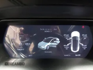 2017 Tesla Model S 100D z VIN 5YJSA1E2XHF224671, wystawiony jako IAAI lot #42665581 z przebiegiem 128 517 mil mil oraz . Historia ofert i sprzedaży dostępna na DreamBid. Obrazek 7.