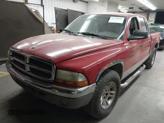 2001 Dodge Dakota Sport with VIN 1B7HL2AN81S296293, listed as a IAAI auction lot 41470036 with 203,323 mi miles. Bid and sale history available at carsss.com. Image 2.