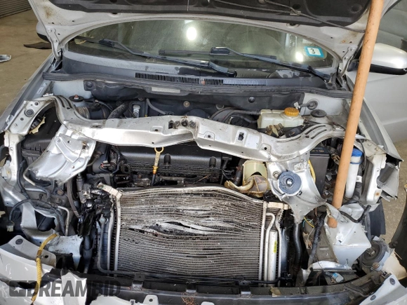 2011 Chevrolet Aveo 1LT with VIN KL1TD5DE2BB230142, listed as a Copart auction lot 57293695 with Not provided miles and Salvage title. Bid and sale history available at DreamBid. Image 11.
