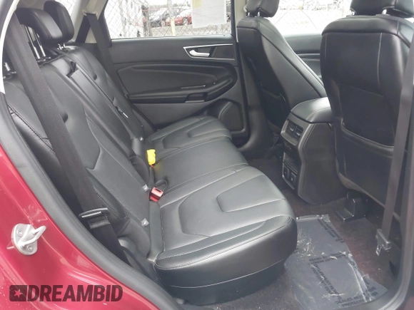 2015 Ford Edge Titanium z VIN 2FMTK4K94FBB69970, wystawiony jako IAAI lot #41982057 z przebiegiem 97 422 mil mil oraz . Historia ofert i sprzedaży dostępna na DreamBid. Obrazek 8.