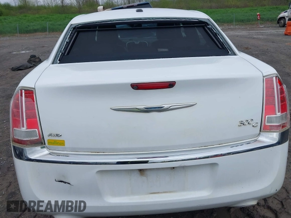 2014 Chrysler 300 C with VIN 2C3CCAKG5EH200996, listed as a IAAI auction lot 42201747 with 156,121 mi miles and . Bid and sale history available at carsss.com. Image 6.