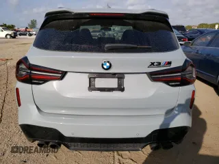 2022 BMW X3 M z VIN 5YM13EC01N9L57914, wystawiony jako Copart lot #38498483 z przebiegiem 17 261 mil mil oraz Szkody całkowita. Historia ofert i sprzedaży dostępna na DreamBid. Obrazek 6.