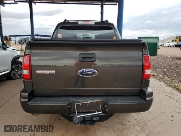 2007 Ford Explorer Sport Trac Limited with VIN 1FMEU33897UA30979, listed as a Copart auction lot 55126065 with 102,175 mi miles and Salvage title. Bid and sale history available at DreamBid. Image 6.
