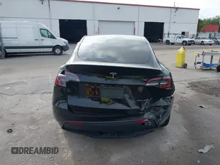 2023 Tesla Model Y Long Range with VIN 7SAYGDEE2PA044328, listed as a IAAI auction lot 42427625 with 41,324 mi miles and . Bid and sale history available at DreamBid. Image 16.