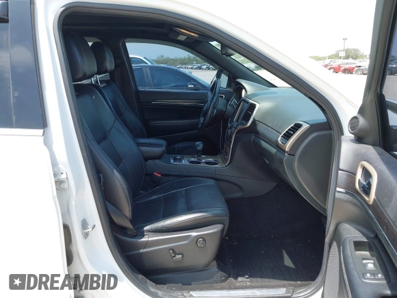 2014 Jeep Grand Cherokee Limited with VIN 1C4RJFBT4EC259448, listed as a IAAI auction lot 42285739 with 129,120 mi miles and . Bid and sale history available at DreamBid. Image 5.