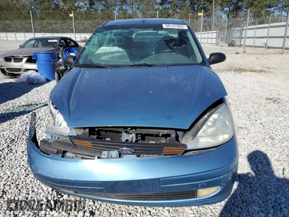 2000 Ford Focus SE with VIN 1FAFP3439YW359633, listed as a Copart auction lot 50147095 with 190,645 mi miles and Salvage Title. Bid and sale history available at carsss.com. Image 5.