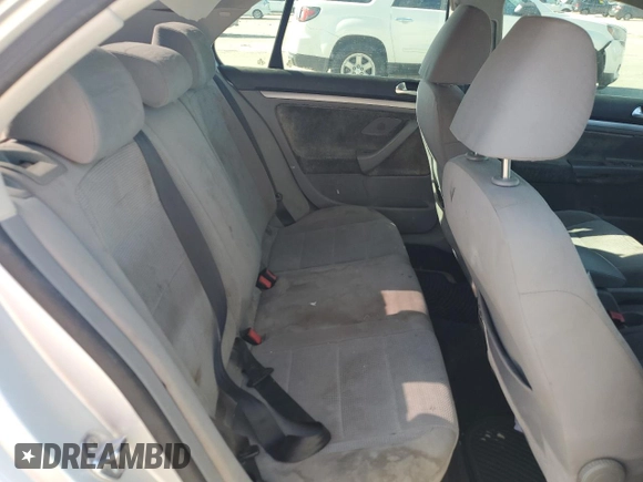 2009 Volkswagen Jetta S z VIN 3VWJM71K79M167562, wystawiony jako Copart lot #80546594 z przebiegiem 196 891 mil mil oraz Szkoda całkowita • Salvage title. Historia ofert i sprzedaży dostępna na DreamBid. Obrazek 10.