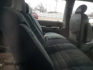 1997 GMC Safari with VIN 1GKEL19WXVB530471, listed as a Copart auction lot 86403504 with Not Provided miles and Salvage Title. Bid and sale history available at carsss.com. Image 11.