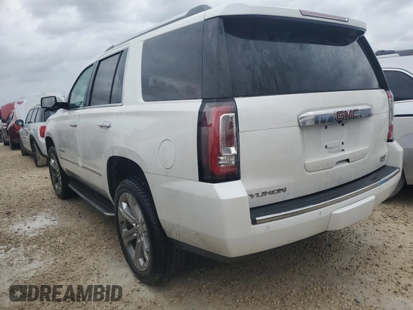 2019 GMC Yukon Denali with VIN 1GKS1CKJ0KR395653, listed as a Copart auction lot 79501764 with 0 mi miles and Salvage Title. Bid and sale history available at carsss.com. Image 2.