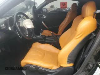 2004 Nissan 350Z Touring with VIN JN1AZ34D04T160475, listed as a Copart auction lot 59435035 with 122,875 mi miles and Salvage title. Bid and sale history available at DreamBid. Image 10.