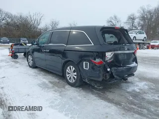 2015 Honda Odyssey EX-L with VIN 5FNRL5H60FB018030, listed as a IAAI auction lot 41608357 with 166,214 mi miles and . Bid and sale history available at carsss.com. Image 3.