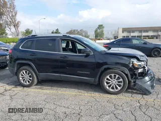 2019 Jeep Cherokee Latitude with VIN 1C4PJLCB8KD215423, listed as a IAAI auction lot 41911882 with 76,965 mi miles. Bid and sale history available at carsss.com. Image 13.