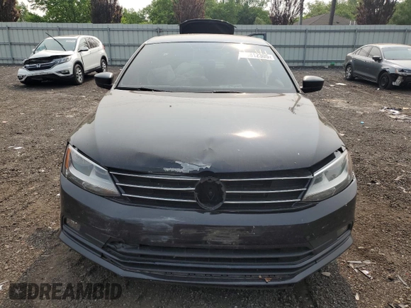 2015 Volkswagen Jetta SE with VIN 3VWD17AJ5FM217805, listed as a Copart auction lot 58812305 with 132,573 mi miles and Salvage title. Bid and sale history available at DreamBid. Image 5.