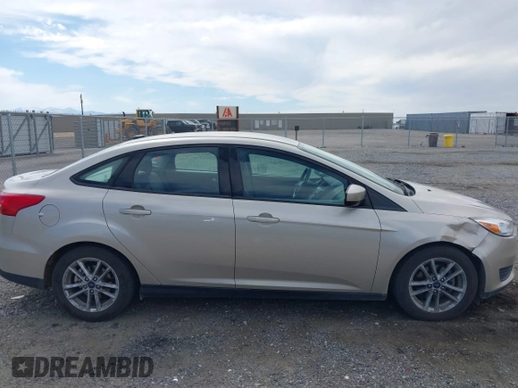 2018 Ford Focus SE with VIN 1FADP3FE7JL230870, listed as a IAAI auction lot 42021541 with 84,000 mi miles. Bid and sale history available at carsss.com. Image 13.
