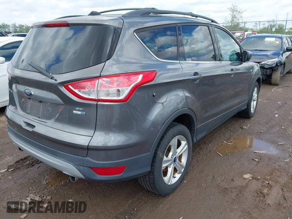 2013 Ford Escape SE with VIN 1FMCU9GX3DUD35255, listed as a IAAI auction lot 42197543 with 154,359 mi miles and . Bid and sale history available at DreamBid. Image 4.