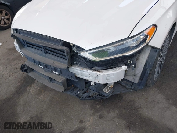 2017 Ford Fusion Hybrid Titanium with VIN 3FA6P0RU8HR229653, listed as a IAAI auction lot 42445182 with 163,279 mi miles and . Bid and sale history available at DreamBid. Image 6.