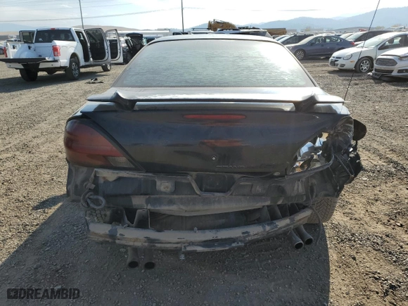 2001 Pontiac Grand Am GT with VIN 1G2NW12E31M584119, listed as a Copart auction lot 76099984 with 293,559 mi miles and Clean Title. Bid and sale history available at carsss.com. Image 6.