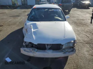 1999 Mazda 626 LX with VIN 1YVGF22D4X5882600, listed as a Copart auction lot 69031604 with 0 mi miles and Salvage Title. Bid and sale history available at carsss.com. Image 5.