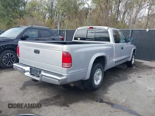 1998 Dodge Dakota SLT with VIN 1B7GL22Y5WS736756, listed as a IAAI auction lot 40687209 with 141,560 mi miles. Bid and sale history available at carsss.com. Image 4.