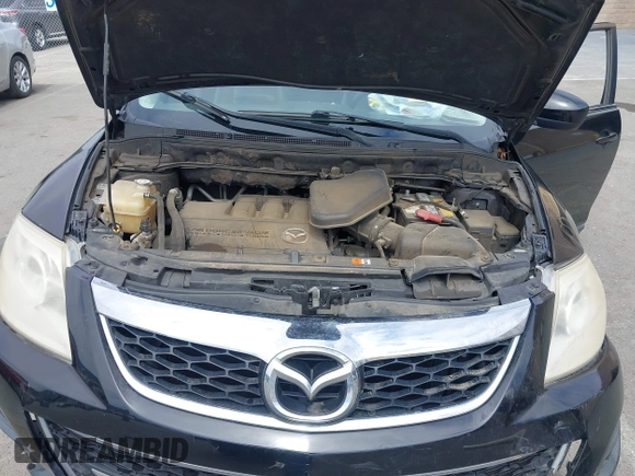 2010 Mazda CX-9 Grand Touring with VIN JM3TB2MV1A0203416, listed as a IAAI auction lot 42090500 with 131,659 mi miles and . Bid and sale history available at carsss.com. Image 10.