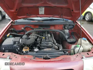 2000 Suzuki Vitara JX z VIN 2S3TD52V9Y6100173, wystawiony jako Copart lot #86200824 z przebiegiem Nie podano mil oraz Szkody całkowita. Historia ofert i sprzedaży dostępna na DreamBid. Obrazek 11.