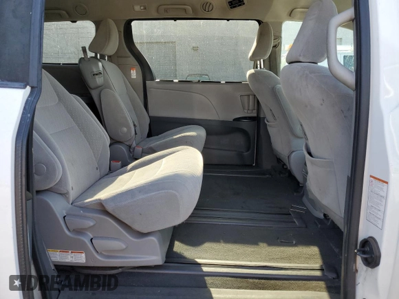 2020 Toyota Sienna LE Auto Access Seat с VIN 5TDKZ3DC8LS038386, выставлен на аукционе Copart как лот 57040115 с пробегом 87 245 миль миль и Списание • Salvage title. История ставок и продаж доступна на DreamBid. Изображение 11.