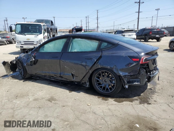 2025 Tesla Model 3 Long Range with VIN 5YJ3E1EA5SF999984, listed as a Copart auction lot 58244825 with Not provided miles and Salvage title. Bid and sale history available at DreamBid. Image 2.