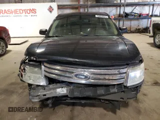 2009 Ford Taurus SEL with VIN 1FAHP27W99G102850, listed as a Copart auction lot 50009975 with 184,829 mi miles and Salvage Title. Bid and sale history available at carsss.com. Image 5.