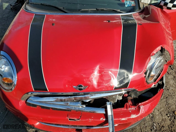 2013 MINI Cooper Convertible with VIN WMWZN3C58DT265980, listed as a Copart auction lot 77157154 with 88,975 mi miles and Salvage Title. Bid and sale history available at carsss.com. Image 11.