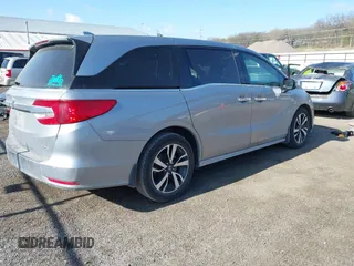 2018 Honda Odyssey Elite z VIN 5FNRL6H91JB070355, wystawiony jako IAAI lot #41975916 z przebiegiem 147 022 mil mil oraz . Historia ofert i sprzedaży dostępna na DreamBid. Obrazek 4.