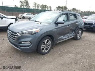 2017 Hyundai Tucson Value with VIN KM8J33A21HU359113, listed as a IAAI auction lot 41897638 with 80,010 mi miles. Bid and sale history available at carsss.com. Image 2.