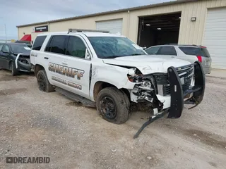 2020 Chevrolet Tahoe Commercial with VIN 1GNLCDEC7LR199179, listed as a IAAI auction lot 41502623 with 87,271 mi miles. Bid and sale history available at carsss.com. Image 1.