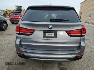 2016 BMW X5 xDrive50i z VIN 5UXKR6C51G0J80753, wystawiony jako Copart lot #55925875 z przebiegiem 133 309 mil mil oraz Szkoda całkowita • Salvage title. Historia ofert i sprzedaży dostępna na DreamBid. Obrazek 6.