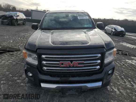 2015 GMC Canyon 4WD SLE with VIN 1GTG6BE34F1165547, listed as a Copart auction lot 43930715 with 124,970 mi miles and Salvage Title. Bid and sale history available at carsss.com. Image 5.