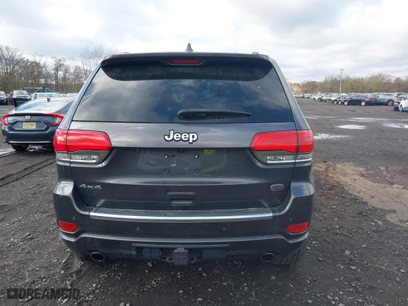 2014 Jeep Grand Cherokee Overland with VIN 1C4RJFCG5EC329377, listed as a IAAI auction lot 40822324 with 106,222 mi miles. Bid and sale history available at carsss.com. Image 17.