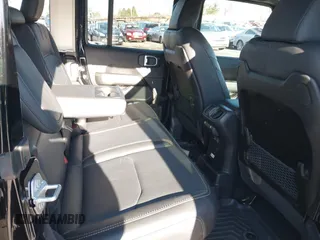 2024 Jeep Wrangler Sahara with VIN 1C4RJXP62RW126989, listed as a IAAI auction lot 41816525 with 11,241 mi miles and . Bid and sale history available at DreamBid. Image 8.