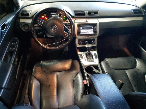 2010 Volkswagen Passat Sedan Komfort with VIN WVWJM7AN2AE139384, listed as a Copart auction lot 70279744 with 151,710 mi miles and Salvage Title. Bid and sale history available at carsss.com. Image 8.