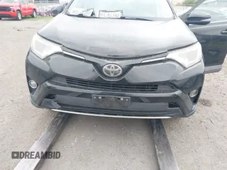 2017 Toyota RAV4 XLE with VIN 2T3WFREV1HW372889, listed as a IAAI auction lot 41895613 with 112,408 mi miles. Bid and sale history available at carsss.com. Image 6.