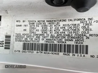 2010 Toyota Tacoma with VIN 5TENX4CN6AZ703135, listed as a IAAI auction lot 41853780 with 304,209 mi miles. Bid and sale history available at carsss.com. Image 9.