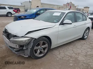 2014 BMW 3 Series 320i xDrive with VIN WBA3C3C52EP661389, listed as a IAAI auction lot 42160042 with 131,997 mi miles and . Bid and sale history available at DreamBid. Image 18.