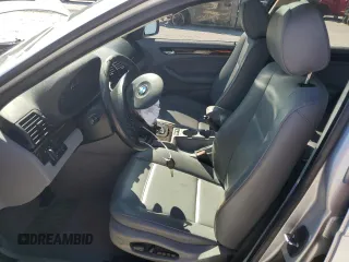 2003 BMW 3 Series 325i with VIN WBAEV33483KL85434, listed as a Copart auction lot 49716595 with 70,066 mi miles and Salvage Title. Bid and sale history available at carsss.com. Image 7.