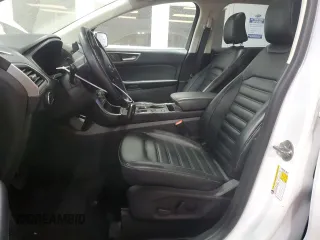 2023 Ford Edge SEL z VIN 2FMPK4J94PBA22570, wystawiony jako Copart lot #56350435 z przebiegiem 27 761 mil mil oraz Szkoda całkowita • Salvage title. Historia ofert i sprzedaży dostępna na DreamBid. Obrazek 7.