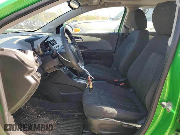 2014 Chevrolet Sonic LT with VIN 1G1JC6SB7E4233377, listed as a Copart auction lot 48409594 with 96,927 mi miles and Salvage Title. Bid and sale history available at carsss.com. Image 7.