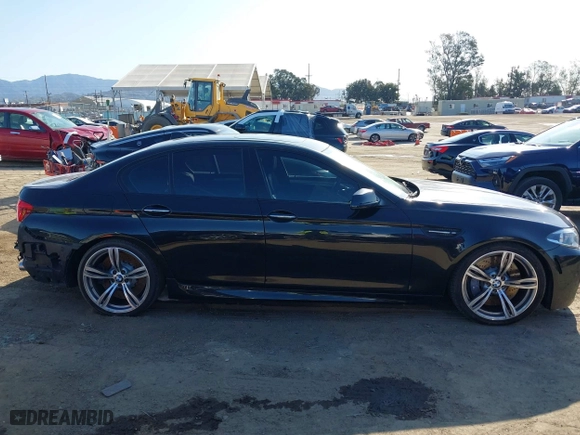 2014 BMW M5 with VIN WBSFV9C56ED097611, listed as a IAAI auction lot 41845196 with 72,215 mi miles. Bid and sale history available at carsss.com. Image 13.