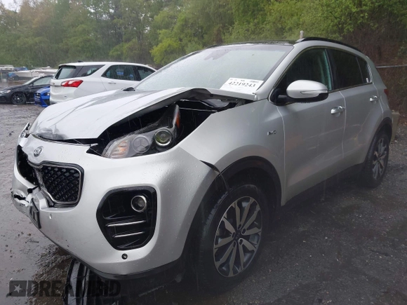 2018 Kia Sportage EX z VIN KNDPNCAC8J7309766, wystawiony jako IAAI lot #42219243 z przebiegiem 90 745 mil mil oraz . Historia ofert i sprzedaży dostępna na DreamBid. Obrazek 17.