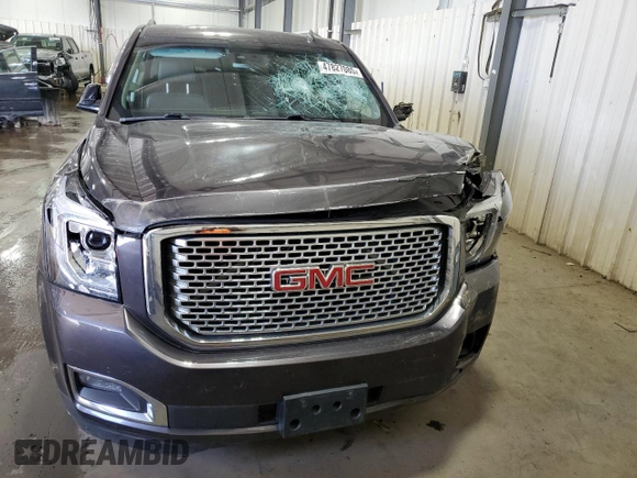 2015 GMC Yukon SLT with VIN 1GKS2BKC7FR279302, listed as a Copart auction lot 47827085 with 176,076 mi miles and Salvage Title. Bid and sale history available at carsss.com. Image 5.