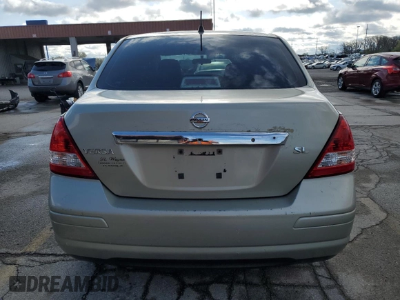 2007 Nissan Versa SL with VIN 3N1BC11E57L445561, listed as a Copart auction lot 53709695 with 143,925 mi miles and Salvage title. Bid and sale history available at DreamBid. Image 6.